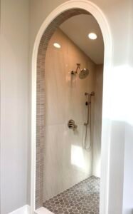 Bathroom Design 8 Bright and airy bathroom layout design featuring sleek white surfaces, gold fixtures, and a walk-in glass shower. This design showcases how simplicity and elegance can elevate your space. A stunning example of bathroom interior design done right.